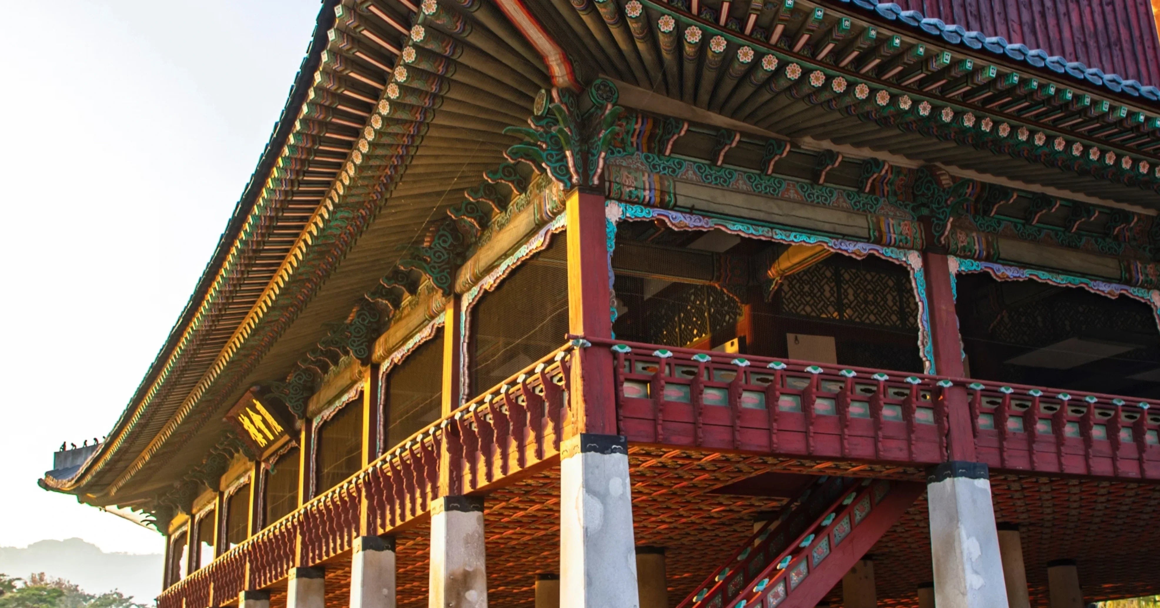 Traditional Korean architecture with ornate eaves, symbolizing the ancient cultural roots of holistic K-beauty rituals.